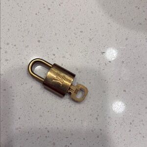 Louis Vuitton Gold Padlock with Key